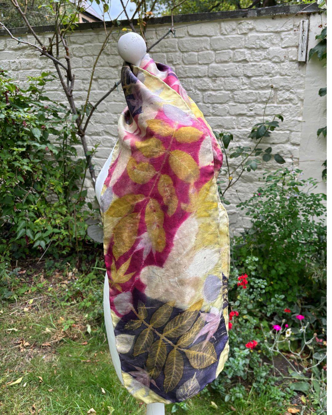 Peace silk scarf dyed with weld, cochineal & logwood,  printed with mixed leaves [SC288]